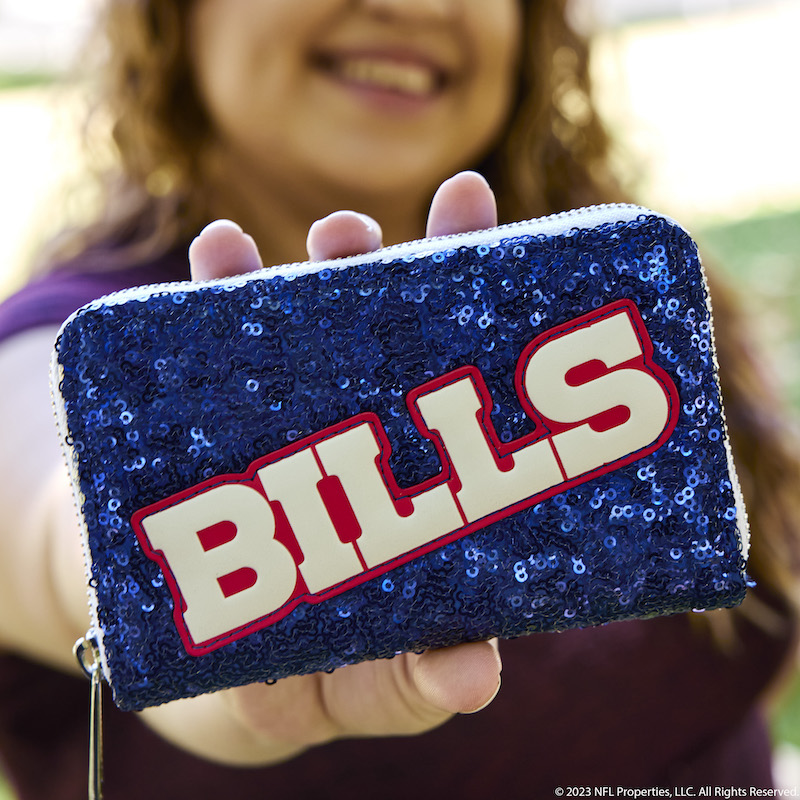 Image of woman holding out the NFL Buffalo Bills Sequin Wallet to the camera 